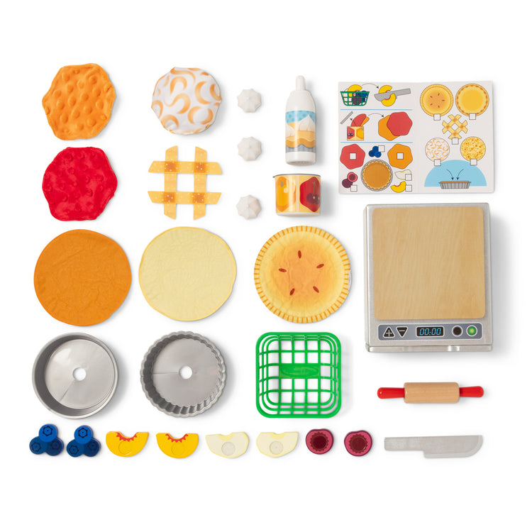 The loose pieces of The Melissa & Doug Make and Bake Pies Pretend Play Food Set And Wooden Oven With Squishy Dough for Ages 3+