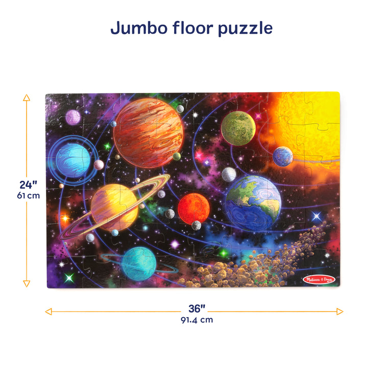 A kid playing with The Melissa & Doug Solar System Jumbo Floor Puzzle, 48-Piece Space-Themed Jigsaw Puzzle With Planet Guide, 3 x 2 Foot Kids Puzzles for Toddlers Ages 3+ (No Text on Puzzle)