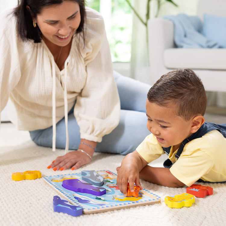 Melissa & Doug How to Find the Best Puzzle for Your 2 Year Old blog post mom and child playing