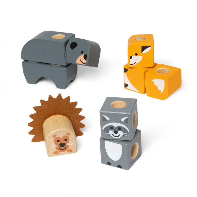 A kid playing with The Melissa & Doug Blockables™ Woodland Friends Snap And Play, Mix And Match Connectable Wooden Building Blocks Play Set Toy for Preschool Boys And Girls (16 Pcs)