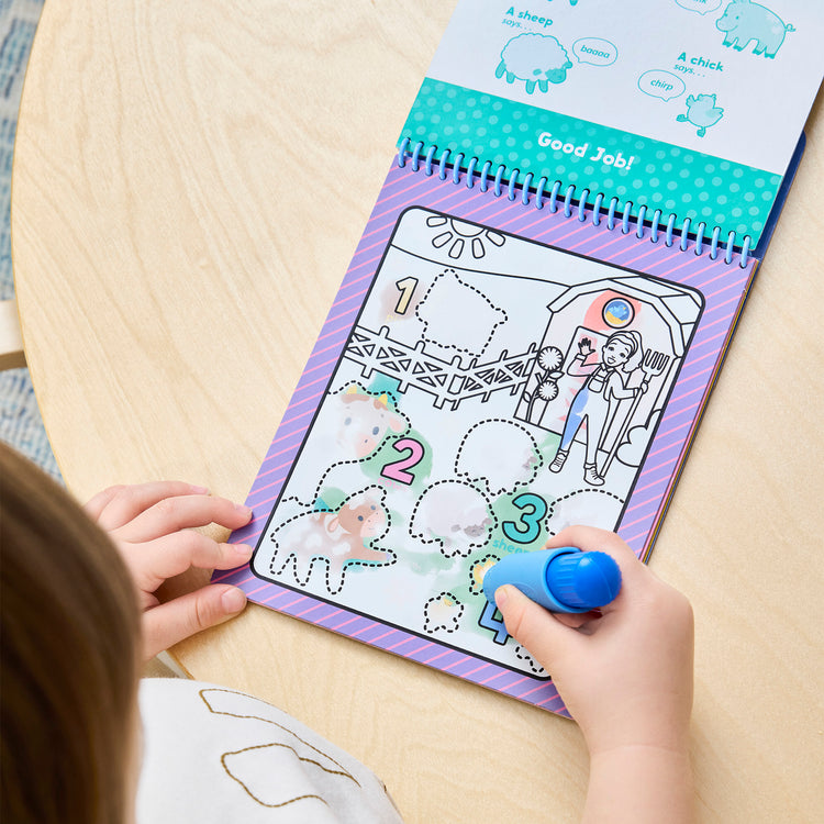 The loose pieces of The Melissa & Doug® Ms. Rachel™ Water WOW! Color-Reveal Pad Early Learning Toy