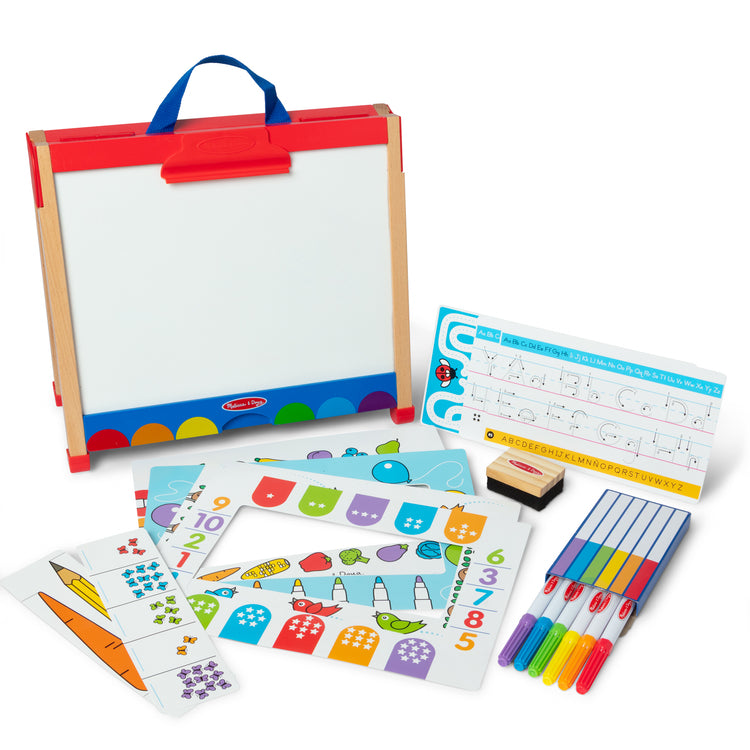 The loose pieces of The Melissa & Doug Take-Along Double-Sided Wooden Tabletop Activity Art Easel; Portable Travel Toy with Whiteboard, Chalkboard, Arts and Crafts Accessories